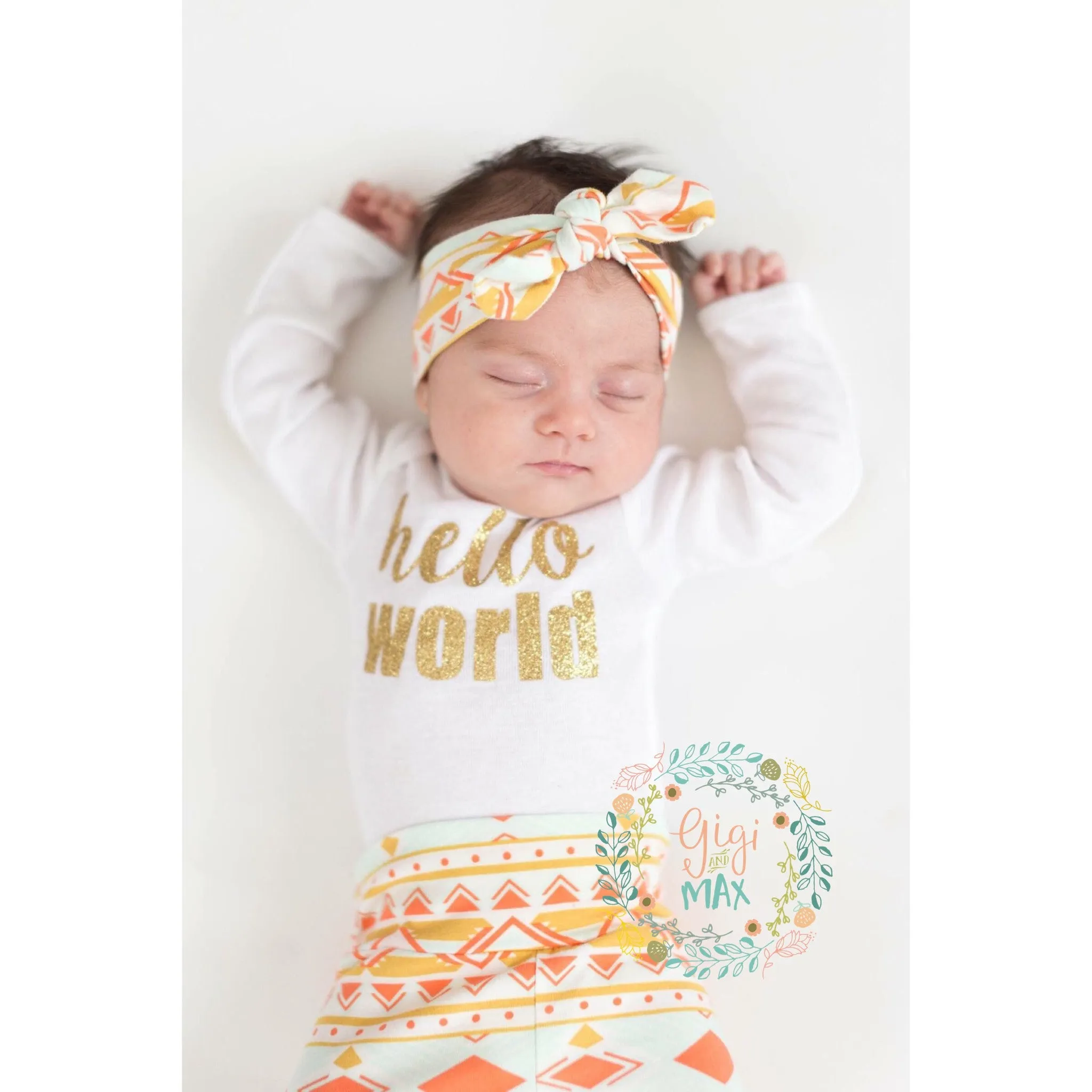 Peach and Mint Aztec Hello World Newborn Outfit