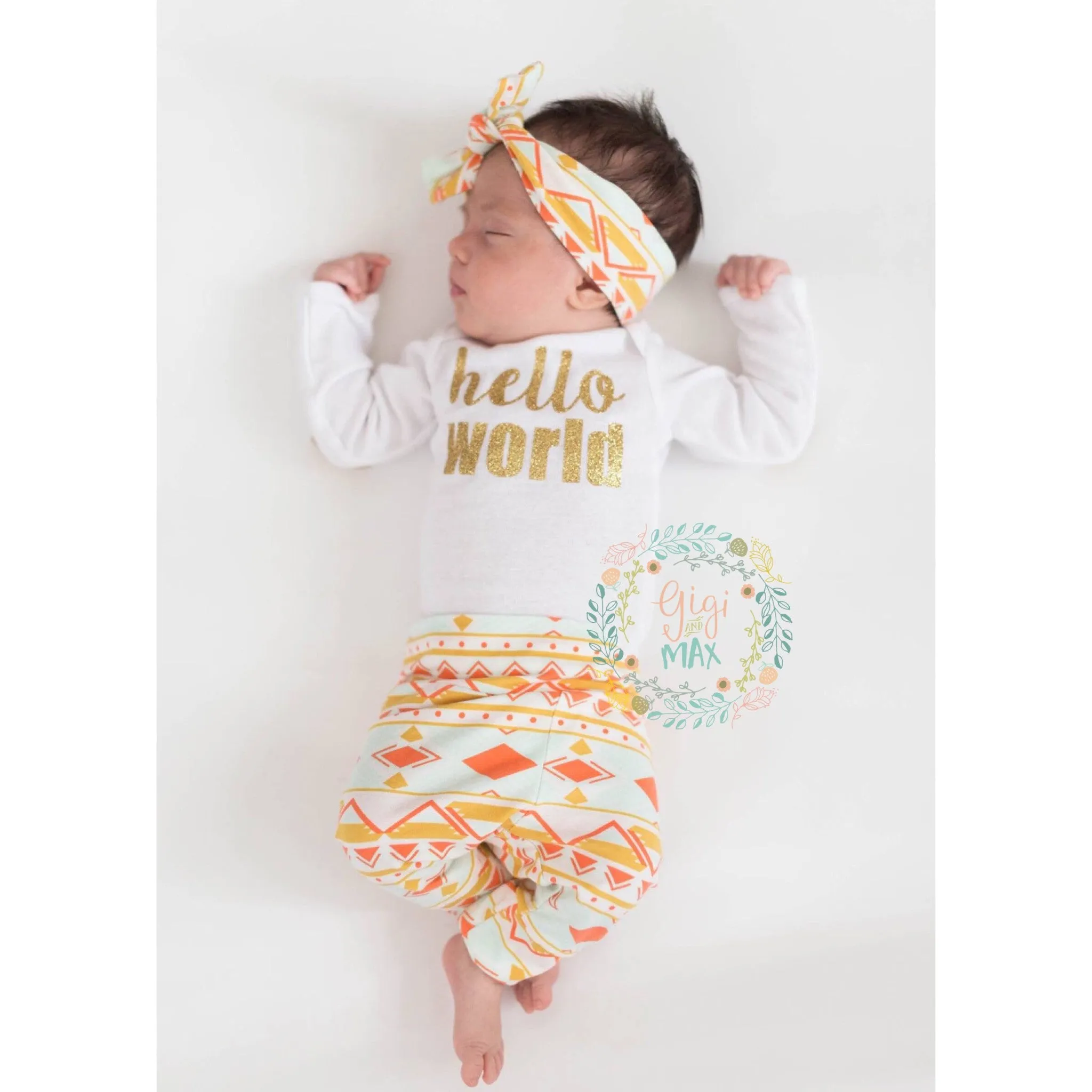 Peach and Mint Aztec Hello World Newborn Outfit