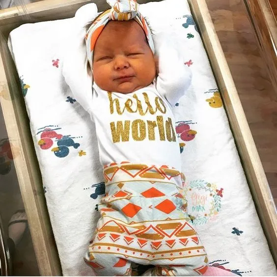Peach and Mint Aztec Hello World Newborn Outfit