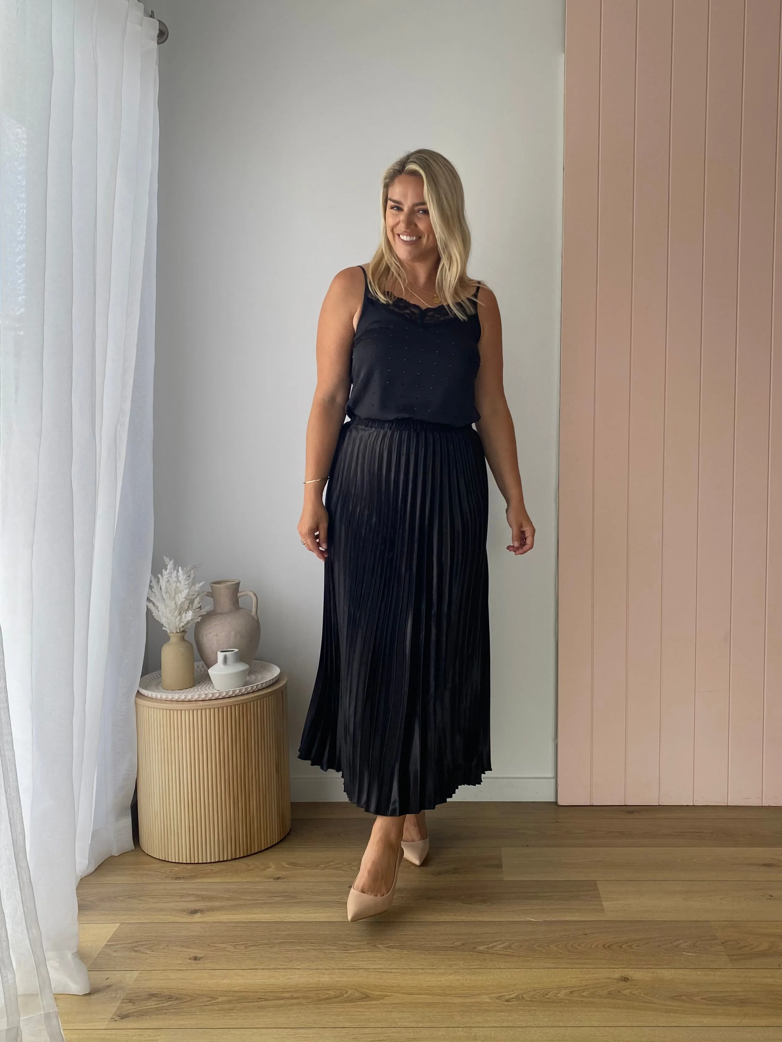 THE LONG PLEATED SKIRT
