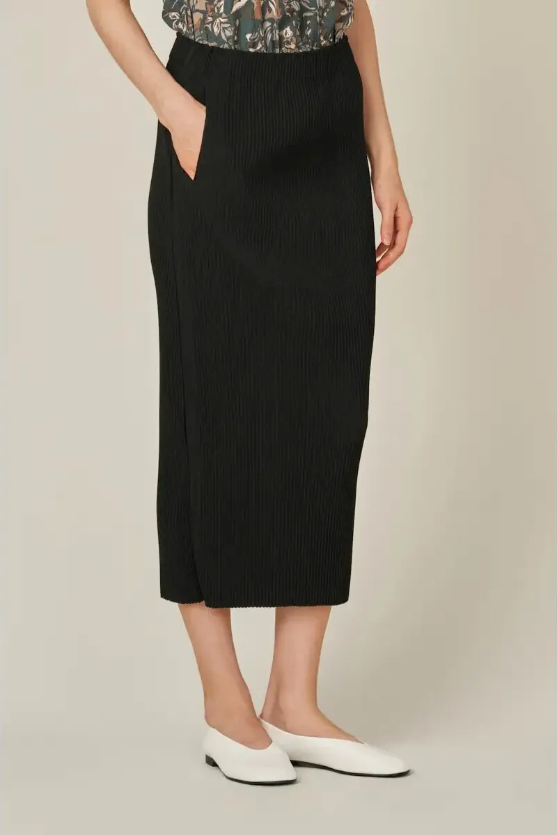 The Pleated Midi Skirt